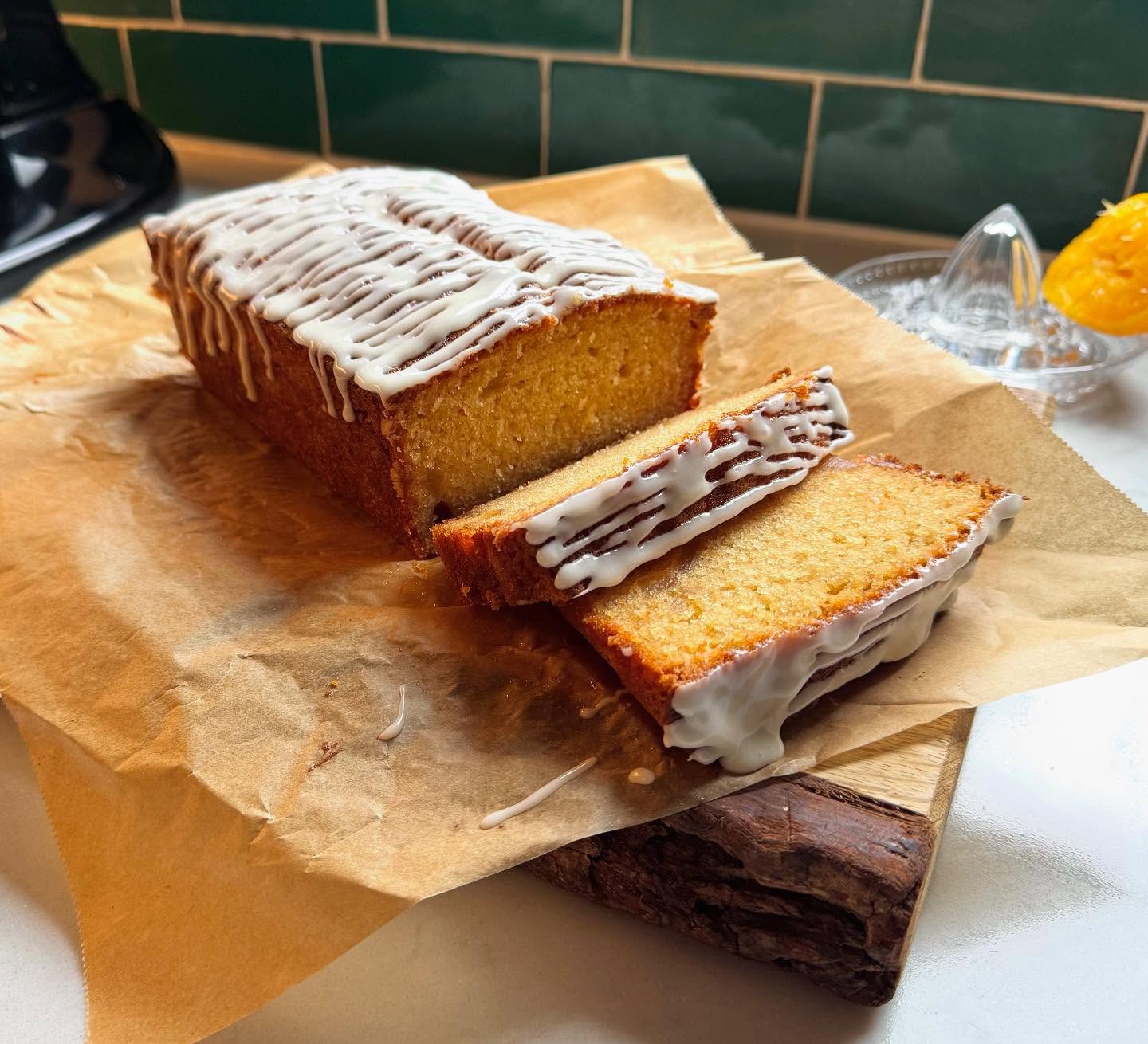 Homemade ginger and marmalade loaf cake, sliced on the counter at Wired Whippet